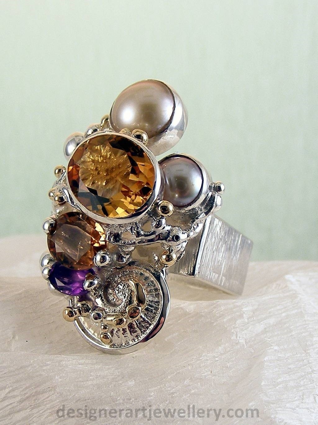 jewelry made from gold and silver, fashion inspired jewelry for women over 40, luxury jewelry shopping, handmade jewelry accessories for women over 50, fashion with elegance over 60 accessoreis and jewelry, jewelry with color stones, jewelry with real pearls, gregory pyra piro square ring 4291, handcrafted jewellery in art and craft galleries, mixed metal handcrafted ring, one of a kind ring in sterling silver and gold, rings for women with pink tourmaline and amethyst, rings for women with pink tourmaline and pearl, rings for women with citrine and pearl
