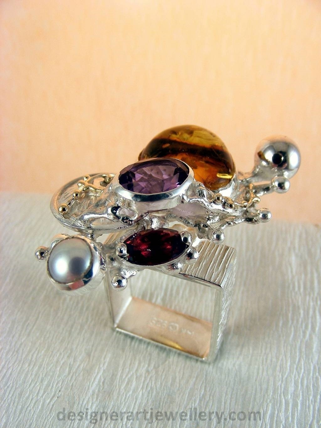 jewelry made from gold and silver, fashion inspired jewelry for women over 40, luxury jewelry shopping, handmade jewelry accessories for women over 50, fashion with elegance over 60 accessoreis and jewelry, jewelry with color stones, jewelry with real pearls, gregory pyra piro square ring 1710, handcrafted jewellery in art and craft galleries, mixed metal handcrafted ring, one of a kind ring in sterling silver and gold, rings for women with amber and amethyst, rings for women with garnet and amber, ring amber and pearl