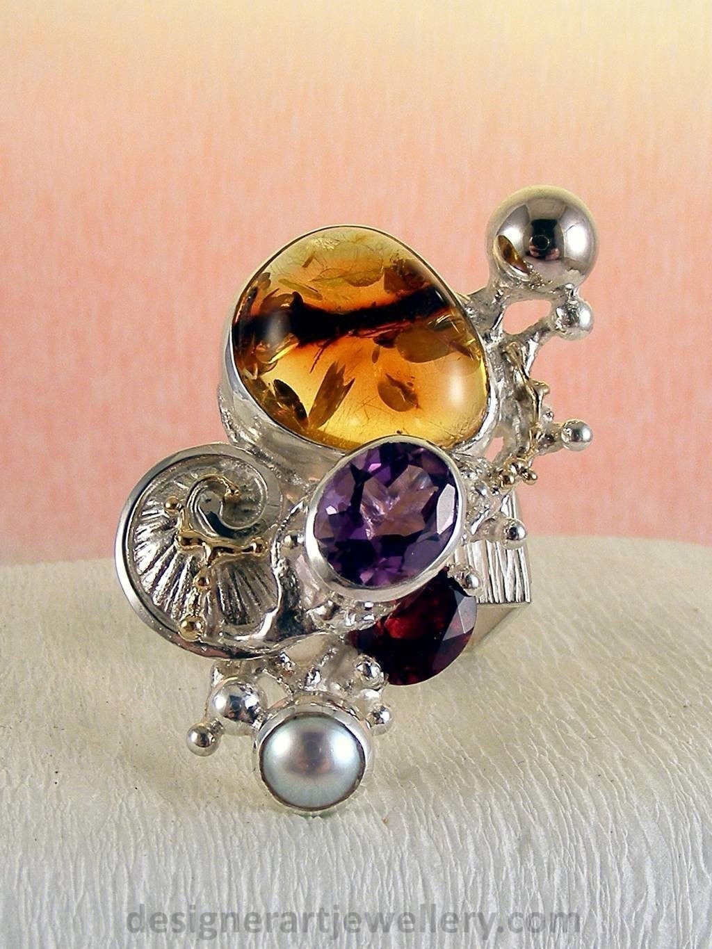 jewelry made from gold and silver, fashion inspired jewelry for women over 40, luxury jewelry shopping, handmade jewelry accessories for women over 50, fashion with elegance over 60 accessoreis and jewelry, jewelry with color stones, jewelry with real pearls, gregory pyra piro square ring 1710, handcrafted jewellery in art and craft galleries, mixed metal handcrafted ring, one of a kind ring in sterling silver and gold, rings for women with amber and amethyst, rings for women with garnet and amber, ring amber and pearl